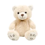 Plush sitting teddy bear with silk bow, 28 cm